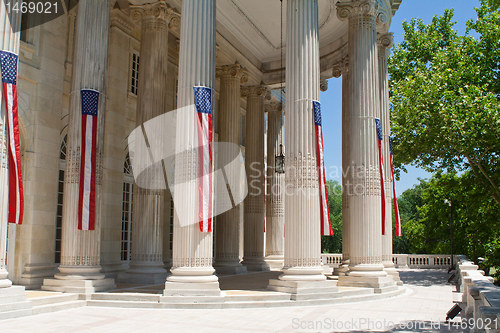 Image of Narrow American Flags Columns Building Washington