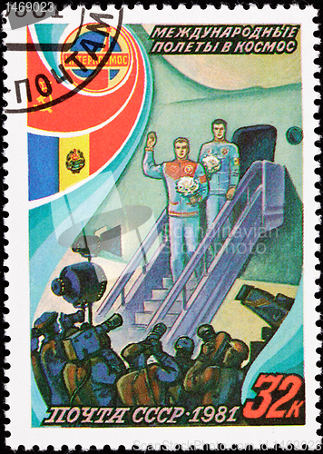 Image of Soviet Postage Stamp Cosmonauts Exit Airplane Press Conference