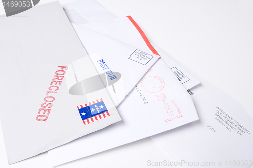 Image of Pile Mail Stamped FORECLOSED PAST DUE Isolated