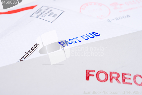 Image of Pile Mail Stamped FORECLOSED PAST DUE Isolated