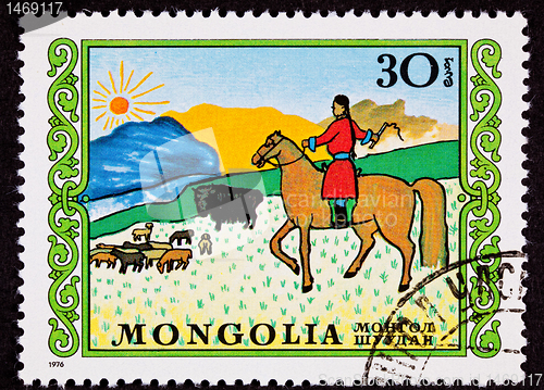 Image of Canceled Mongolian Postage Stamp Horseback Woman Herding Sheep Y