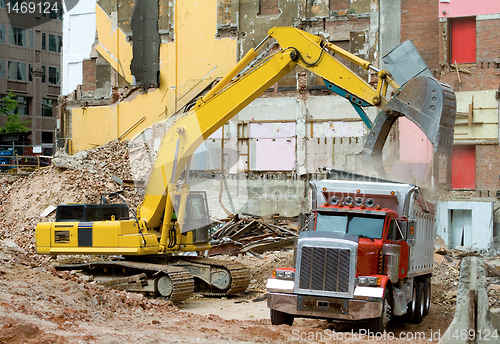 Image of Front End Loader Dropping Demolition Materials 