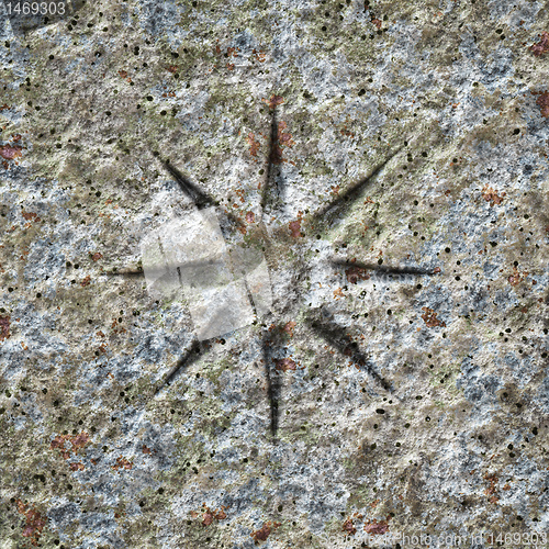 Image of stone texture with a star