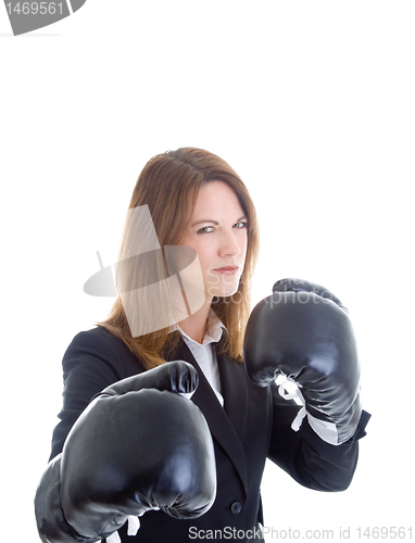 Image of Angry Businesswoman Wearing Boxing Gloves Isolated
