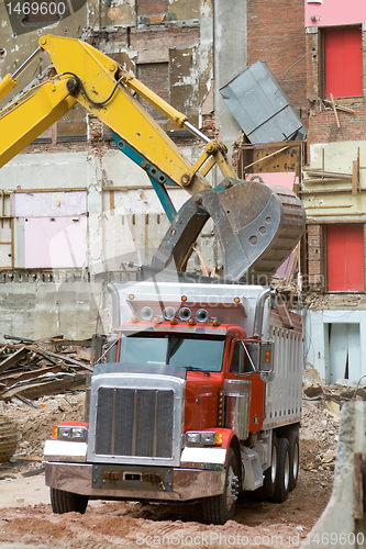 Image of Front End Loader Dropping Scrap Materials Dump 