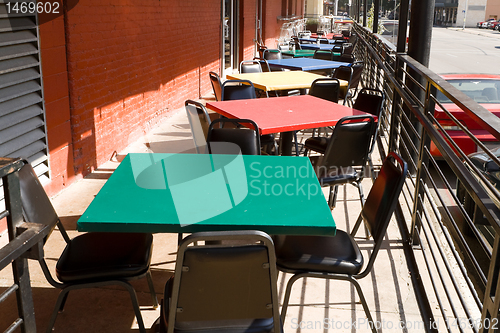 Image of Colorful Tables Chairs Outdoor Restaurant Cafe USA