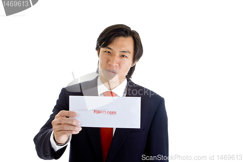 Image of Asian Businessman Foreclosure Notice, Isolated