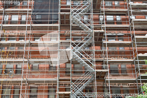 Image of Scaffolding Old Brick Building Under Renovation