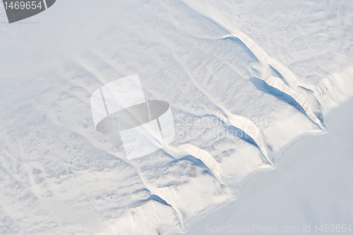 Image of Aerial Frozen River Cliff Showing Erosion, Baffin Island, Canada