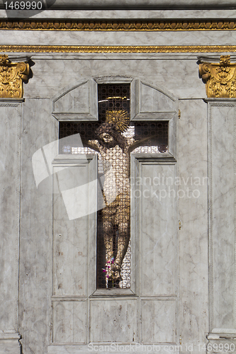Image of Cross of Jesus  in a street of Venice