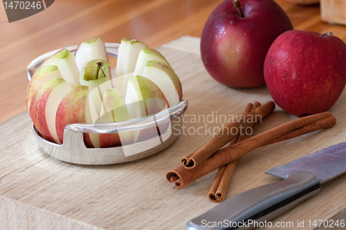 Image of Apple Slicer and Cinnamon Sticks