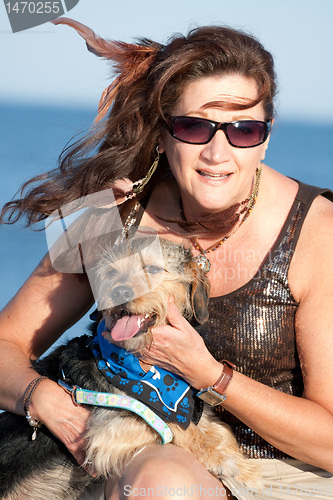 Image of Woman Holding Her Pet Dog