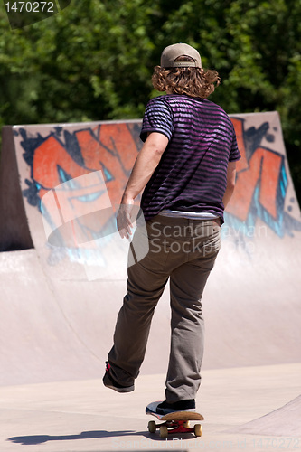 Image of Skateboarder Skating at a Skate Park