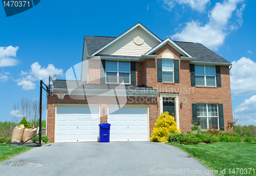 Image of Front Brick Faced Single Family Home Suburban MD