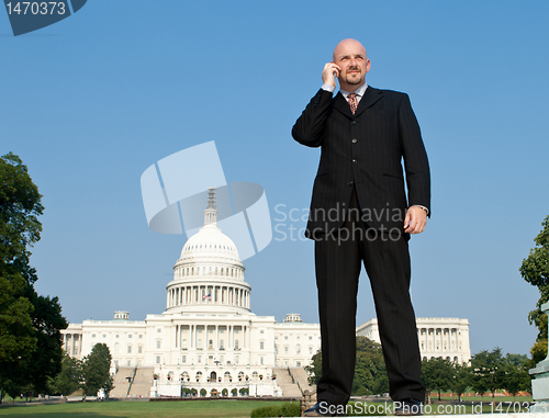 Image of Caucasian Man Suit Phone Standing Washington DC
