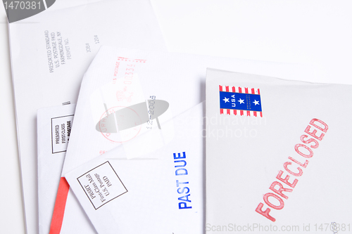 Image of Pile Mail Stamped FORECLOSED PAST DUE Isolated