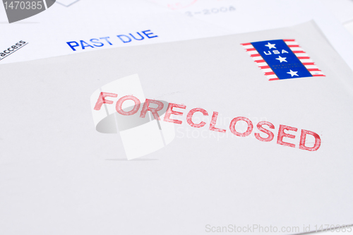 Image of Pile Mail Stamped FORECLOSED PAST DUE Isolated