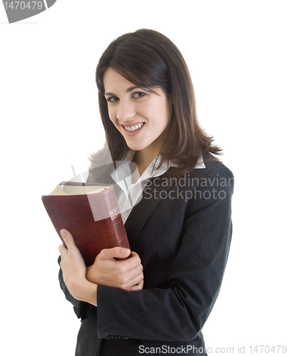 Image of Smiling Woman Holding Bible Closely Isolated White