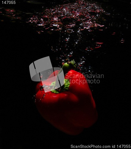 Image of red food in water