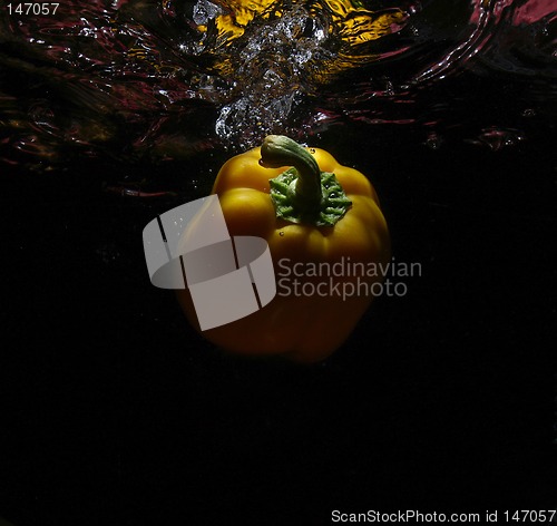 Image of yellow food in water