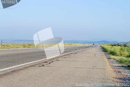 Image of Flat and Straight Highway Taos New Mexico USA