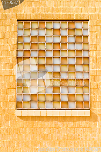 Image of Yellow Window with Opaque Orange White Glass