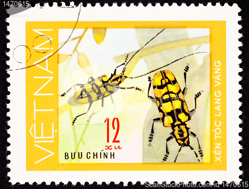 Image of Canceled Vietnam Postage Stamp Pair Yellow Beetles Antenna On Pl