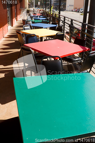 Image of Colorful Tables Chairs Outdoor Restaurant Cafe USA