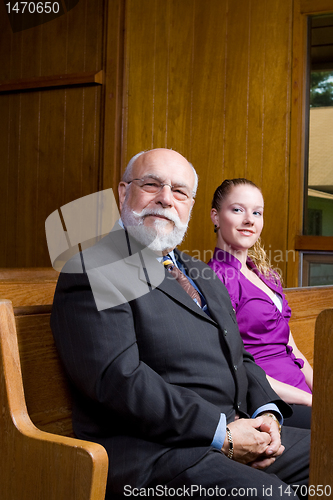 Image of Senior Man Young Woman Smiling Church Pew