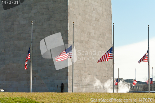 Image of Washington Monument Surrounded Flags Half Mast