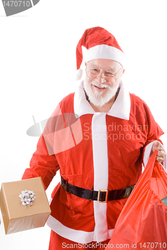 Image of Happy Santa Holding Present and Sack Isolated 