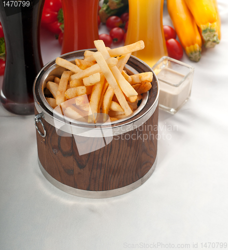 Image of fresh french fries on a bucket