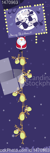 Image of Santa with rein deers hanging on Cristmas billboard