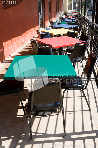 Image of Colorful Tables Chairs Outdoor Restaurant Cafe USA