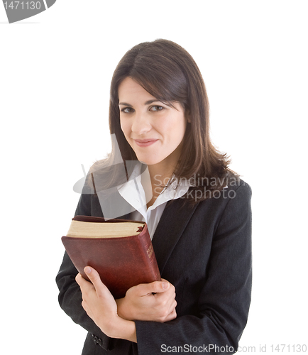 Image of Smiling Woman Holding Bible Closely Isolated White