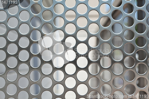 Image of Full Frame Shiny Silver Metal Mesh Grid With Holes