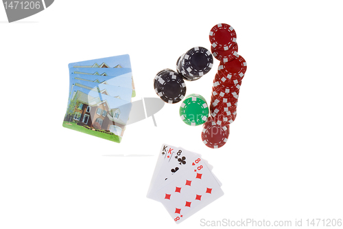 Image of Bet the House Pile Poker Chips House Playing Cards
