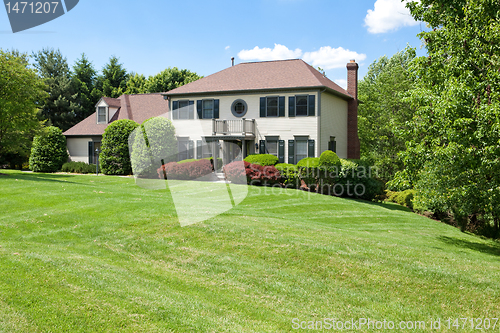 Image of Front Suburban Single Family House Hillside French