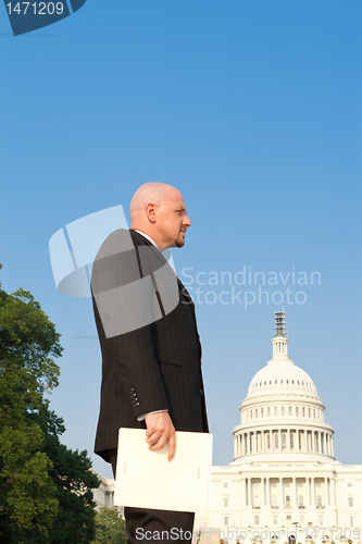 Image of White Man Suit Secret Folder US Capitol Washington 