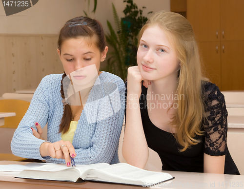 Image of Female students are engaged in the classroom