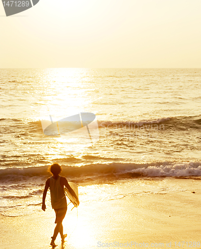 Image of Surfer on the beach