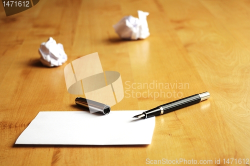 Image of pen and paper