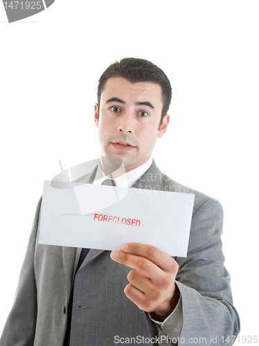 Image of Hispanic Businessman Holding Foreclosure Notice Isolated Backgro