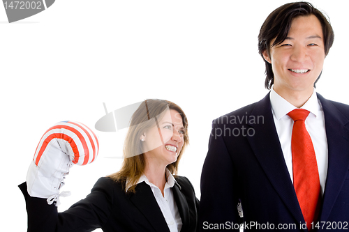 Image of Caucasian Woman Sucker Punching Smiling Asian Man White Backgrou