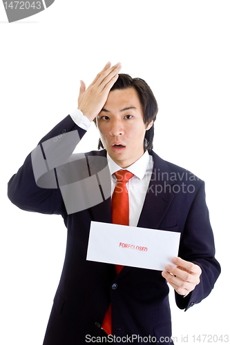 Image of Shocked Asian Man Hand On Head, Foreclosure Notice