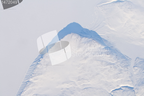 Image of Aerial View Snow and Ice Covered Cliff Baffin Island, Canada 