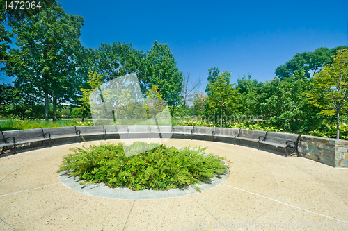 Image of Wide Angle Curving Benches Park Outside in a Row