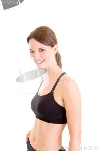 Image of Slender Caucasian Woman in Sports Bra Smiling White Background