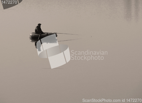 Image of fisherman in a boat 