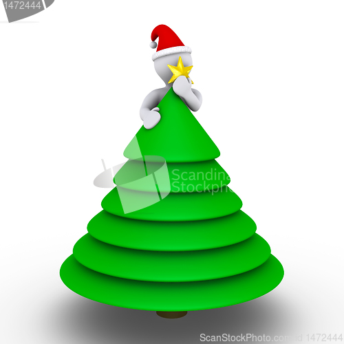 Image of Placing the star on the Christmas tree